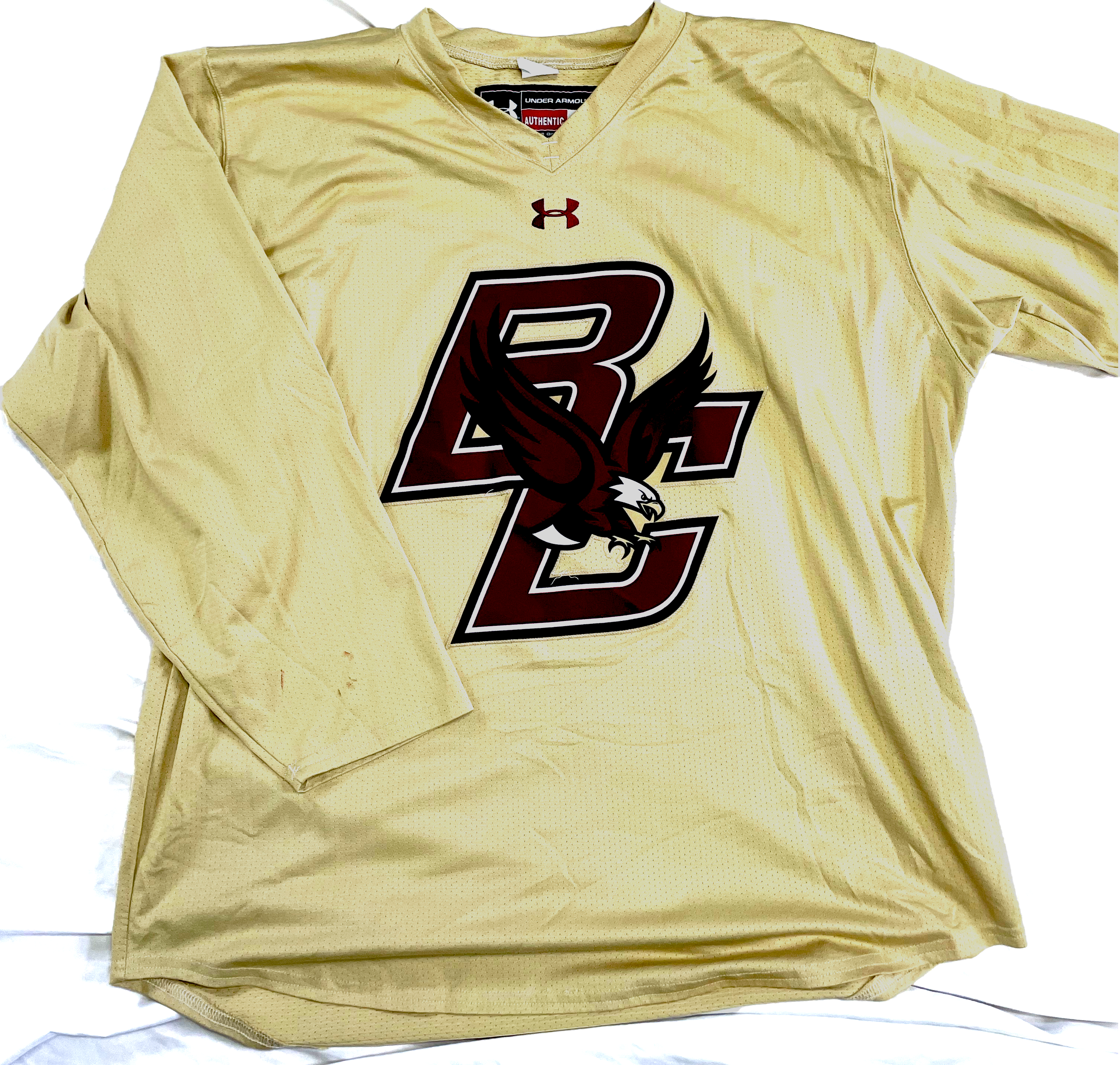 NCAA - Maillot d'entraînement Under Armour d'occasion (or)